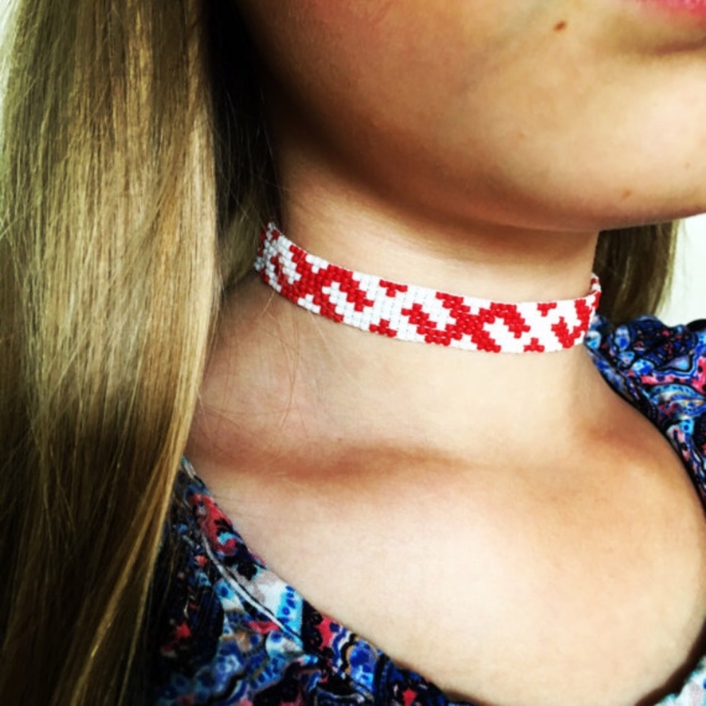 Handmade beaded necklace with protective symbols